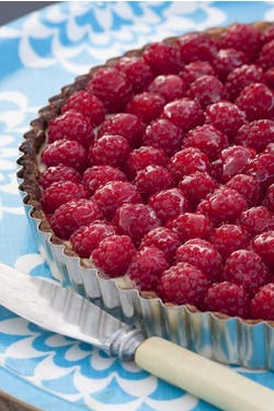 lemon tart topped with raspberries